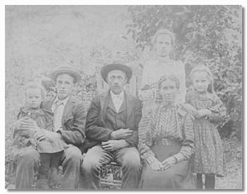 Combs, Andrew J. and Family, 1) James Parks Combs holding Mamie Andrew J. 